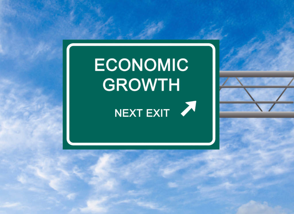 Road sign that says economic growth